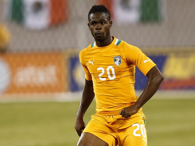 Abdul Razak #20 of Ivory Coast plays against Mexico during their match at MetLife Stadium on August 14, 2013