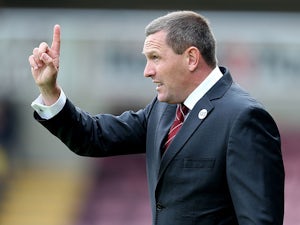 King takes temporary charge of Northampton
