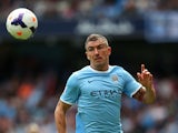 Aleksandar Kolarov of Manchester City during the Barclays Premier League match between Manchester City and Hull City at the Etihad Stadium on August 31, 2013