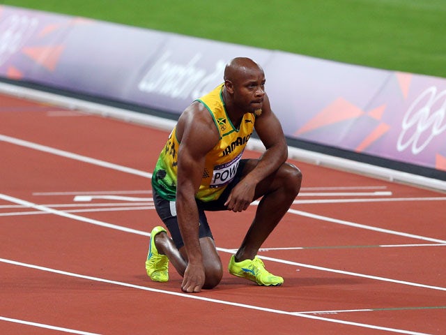 Asafa Powell of Jamaica looks on after the Men's 100m Final on Day 9 of the London 2012 Olympic Games at the Olympic Stadium on August 5, 2012