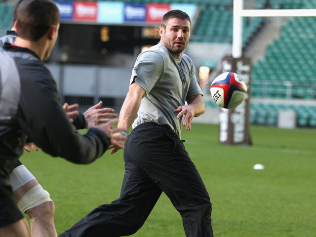 Ben Cohen of the Northern Hemisphere XV for the Help for Heroes Challenge passes the ball during the captain's run at Twickenham Stadium on December 2, 2011