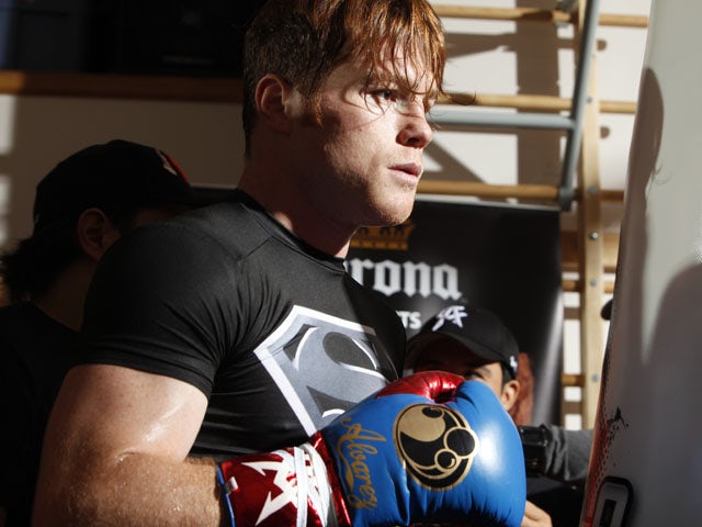 Unified Super Welterweight World Champion Canelo Alvarez holds a media workout on August 27, 2013