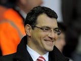 Liverpool Director of Sports Strategy Damien Comolli looks on prior to the Barclays Premier League match between Liverpool and Manchester City at Anfield on April 11, 2011