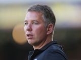 Darren Ferguson, the Peterborough United manager, looks on during the pre season friendly match between Peterborough United and Hull City at London Road Stadium on July 29, 2013
