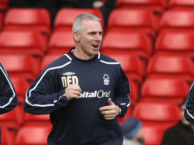 Nottingham Forest assistant manager David Kelly joins Wes Morgan and Luke Chambers in the pre match warm up proir to the Coca Cola Championship match between Nottingham Forest and Plymouth Argyle at the City Ground on January 17, 2009