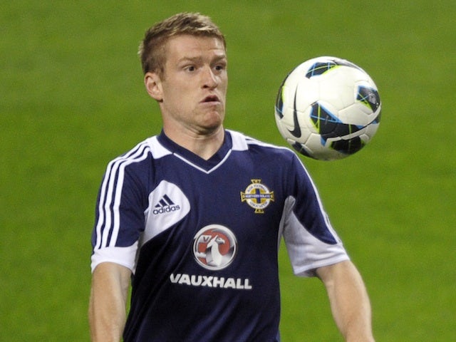 Northern Ireland's Dean Shiels warms up in Portugal on October 15, 2012