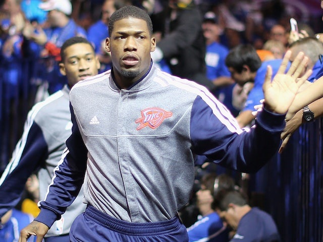 Oklahoma City's DeAndre Liggins enters the court before a game with the Houston Rockets on April 23, 2013