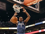 Minnesota Timberwolves' Derrick Williams slam dunks the ball against Phoenix Suns on March 12, 2012