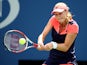 Ekaterina Makarova of Russia plays a backhand during her women's singles quarter-final match against Na Li of China on Day Nine of the 2013 US Open at USTA Billie Jean King National Tennis Center on September 3, 2013