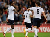 Danny Welbeck of England is congratulated by Frank Lampard of England on acroing their third goal during the FIFA 2014 World Cup Qualifying Group H match between England and Moldova at Wembley Stadium on September 6, 2013