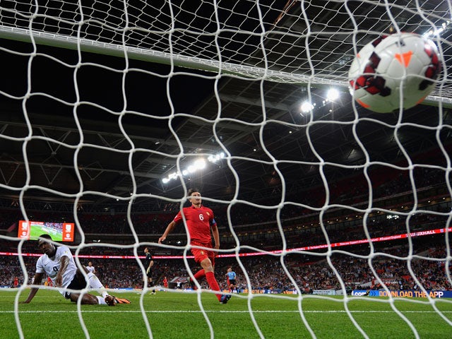 Danny Welbeck of England scores their third goal during the FIFA 2014 World Cup Qualifying Group H match between England and Moldova at Wembley Stadium on September 6, 2013