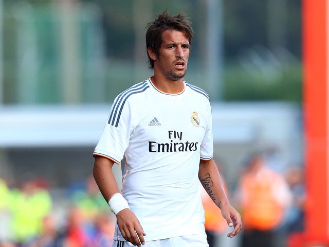 Fabio Coentrao of Real Madrid looks on during a pre season friendly match between AFC Bournemouth and Real Madrid at Goldsands Stadium on July 21, 2013