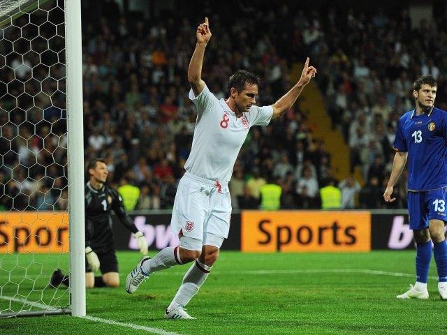 Frank Lampard celebrates scoring for England against Moldova.