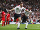 Frank Lampard celebrates scoring for England against Wales in a World Cup qualifier at Old Trafford.
