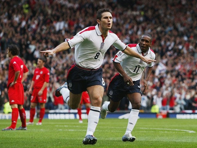 Frank Lampard celebrates scoring for England against Wales in a World Cup qualifier at Old Trafford.