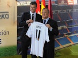 Gareth Bale is presented as a Real Madrid player by president Florentino Perez at the Bernabeu on September 2, 2013