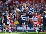 Jonathan Mills of Sale Sharks is upended catching a high ball during the Aviva Premiership match between Gloucester and Sale Sharks at Kingsholm Stadium on September 7, 2013