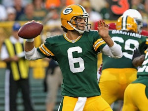 Graham Harrell #6 of the Green Bay Packers passes against the Arizona Cardinals at Lambeau Field on August 9, 2013