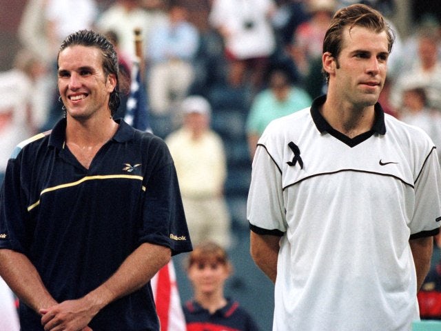 Greg Rusedski and Pat Rafter wait for their trophies after the 1997 US Open final.