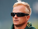 Heikki Kovalainen of Finland and Caterham arrives in the paddock before the final practice session prior to qualifying for the Belgian Grand Prix at Circuit de Spa-Francorchamps on August 24, 2013