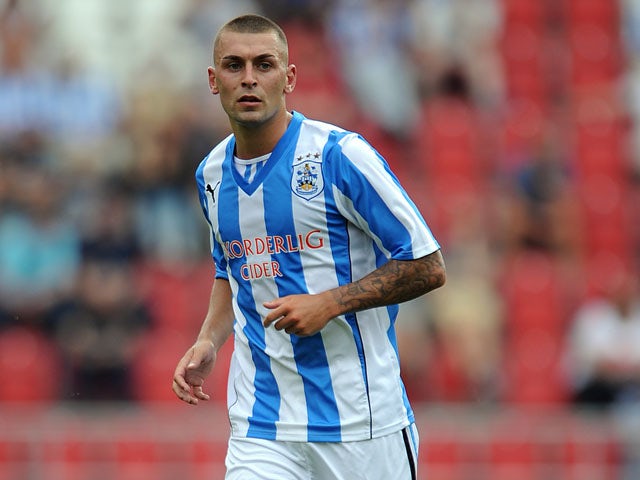 Jack Hunt of Huddersfield Town in action during the pre season friendly match between Rotherham United and Huddersfield Town at The New York Stadium on July 20, 2013