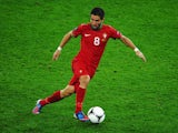 Portugal midfielder Joao Moutinho with the ball against Germany in their Euro 2012 match on June 9, 2012