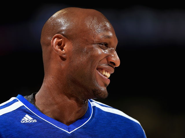 Lamar Odom #7 of the Los Angeles Clippers warms up prior to facing the Los Angeles Clippers at the Pepsi Center on March 7, 2013