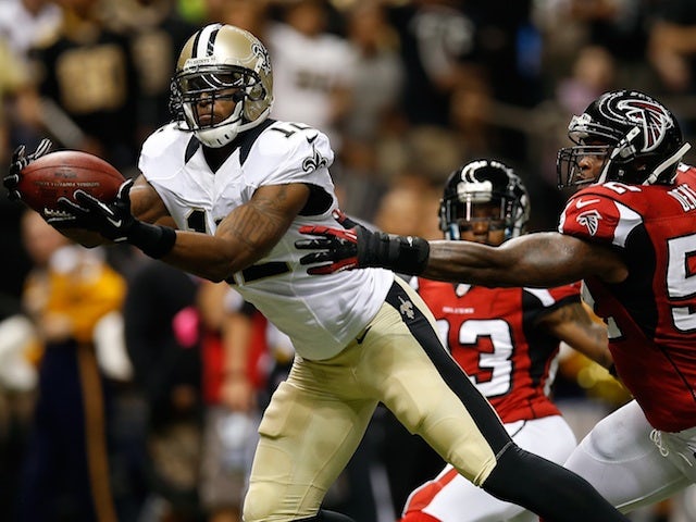 Saints' Marques Colston catches a touchdown pass against the Saints on September 8, 2013