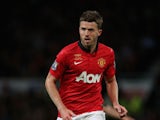Michael Carrick of Manchester United in action during the Rio Ferdinand Testimonial Match between Manchester United and Sevilla at Old Trafford on August 9, 2013