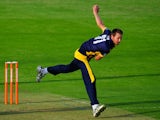Dragons bowler Michael Hogan in action during the Friends Life T20 match between Glamorgan Dragons and Worcestershire Royals at SWALEC Stadium on July 23, 2013