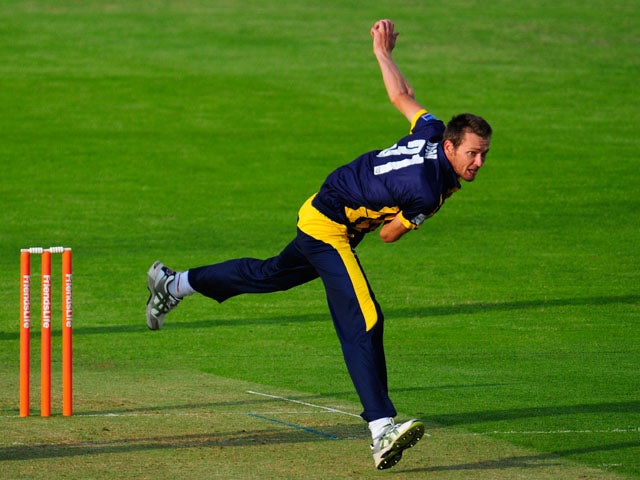 Dragons bowler Michael Hogan in action during the Friends Life T20 match between Glamorgan Dragons and Worcestershire Royals at SWALEC Stadium on July 23, 2013