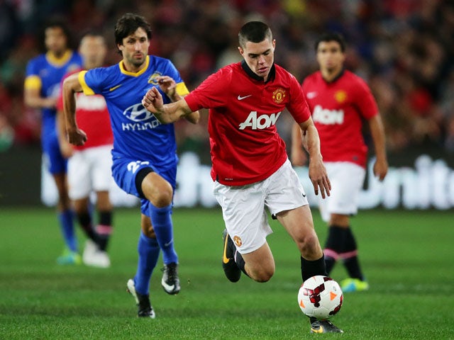 Michael Keane of Manchester United controls the ball during the match between the A-League All-Stars and Manchester United at ANZ Stadium on July 20, 2013