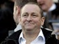 Newcastle United's owner Mike Ashley watches his team play Chelsea in the English Premier League football match at St James' Park, Newcastle-upon-Tyne on December 3, 2011