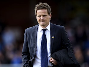 Neal Ardley rues tame defeat to Portsmouth