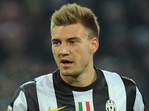 Wenger: 'Bendtner still has a part to play'