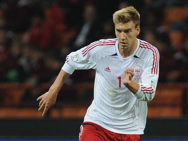 Nicklas Bendtner of Denmark in action during the FIFA 2014 World Cup qualifier match between Italy and Denmark at Stadio Giuseppe Meazza on October 16, 2012