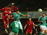Cristiano Ronaldo of Portugal scores during the FIFA 2014 World Cup Qualifying Group F match between Northern Ireland and Portugal at Windsor Park on September 6, 2013
