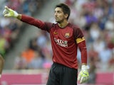 Barcelona's goalkeeper Oier Olazabal reacts during the friendly football Uli Hoeness Cup match between FC Bayern Munich and FC Barcelona in the stadium in Munich, southern Germany, on July 24, 2013
