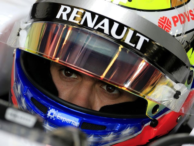 William's Venezuelan driver Pastor Maldonado sits in the pits during the first practice session at the Autodromo Nazionale circuit in Monza on September 6, 2013