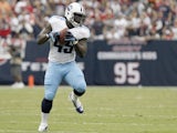 Quinn Johnson #45 of the Tennessee Titans runs after the catch against the Houston Texans on September 30, 2012