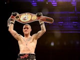 Ricky Burns celebrates his victory over Jose Gonzalez during their World WBO Lightweight Championship bout on May 11, 2013