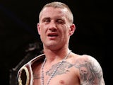 Ricky Burns stands in the ring after his fight with Raymundo Beltran on September 7, 2013