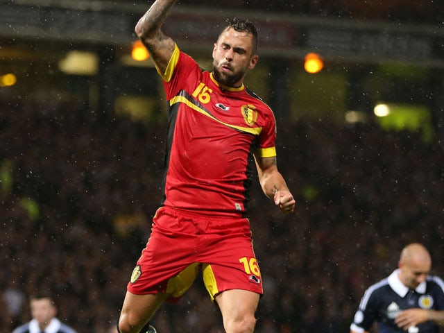 Steven Defour of Belgium celebrates his goal during the 2014 World Cup Group A qualifying football match between Scotland and Belgium at Hampden Park in Glasgow, Scotland, on September 6, 2013