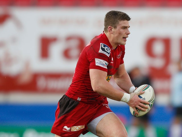 Scott Williams of Scarlets runs with the ball during the Heineken Cup match between Scarlets and Exeter Chiefs at Parc y Scarlets on December 8, 2012