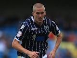 Steve Morison of Millwall in action during the Sky Bet Championship match between Millwall and Huddersfield Town at The Den on August 17, 2013 