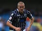 Steve Morison of Millwall in action during the Sky Bet Championship match between Millwall and Huddersfield Town at The Den on August 17, 2013 