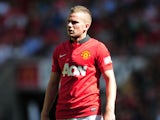 Tom Cleverley of Manchester United looks on during the FA Community Shield match between Manchester United and Wigan Athletic at Wembley Stadium on August 11, 2013