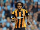 Tom Huddlestone of Hull City in action during the Barclays Premier League match between Manchester City and Hull City at the Etihad Stadium on August 31, 2013