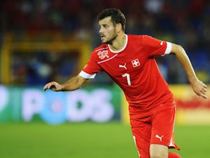 Tranquillo Barnetta of Switzerland controles the ball during the international friendly match between Switzerland and Brazil at St. Jakob Stadium on August 14, 2013