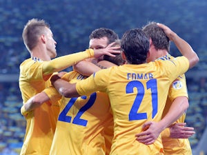 Players of Ukraine celebrate scoring against San Marino during their Brazil 2014 FIFA World Cup qualifiers, Group H, football match in Lviv on September 6, 2013
